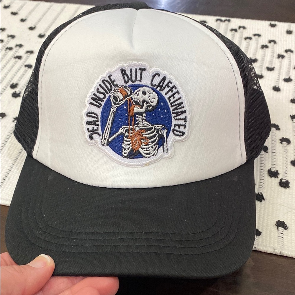 Black and White Trucker Hat with Skeleton Patch